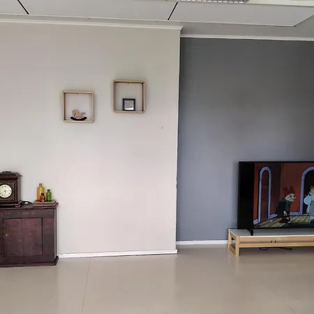Vanha Hirsikoulun Ylaekerta Apartmán *