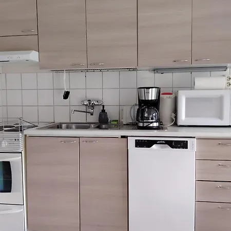 Vanha Hirsikoulun Ylaekerta Apartmán *
